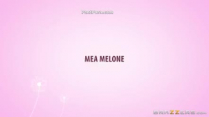 Mea Melone is gently rubbing her boyfriend's penis while he is trying to make a video of her