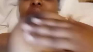 Ebony MILF babe fingering on a balls nipple