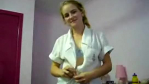 Blonde teen strips off her pink blouse