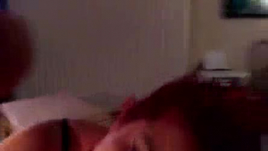 Red haired chick is taking a bath with her younger friend, and getting a nice, deep blowjob.