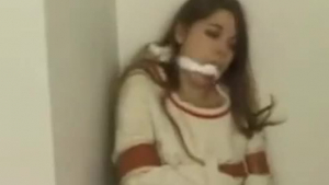 Gagged teen is experiencing decent pain all day long, while her girlfriend is making porn video
