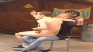 Two horny guys are about to fuck each other on the floor, in the living room.