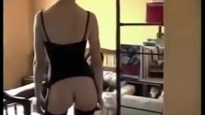Red haired woman is getting fucked in the living room, by an experienced man from her neighborhood