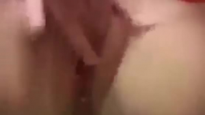 Busty blonde woman is masturbating in a sauna in front of the camera, because she needs some cash.